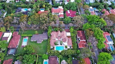 Set on one of Coral Gables finest tree-lined streets, this - photo 35