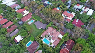 Set on one of Coral Gables finest tree-lined streets, this - photo 36