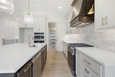 Nestled on a private, wooded estate lot at the end of a quiet - photo 12