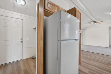 This recently remodeled 3 Bedroom, 2 Bath manufactured home is - photo 8
