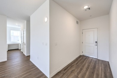 Experience unparalleled luxury in this second-floor corner unit