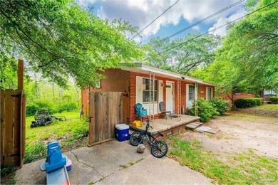 Welcome to this charming 3-bedroom, 1-bath brick home nestled on - photo 3
