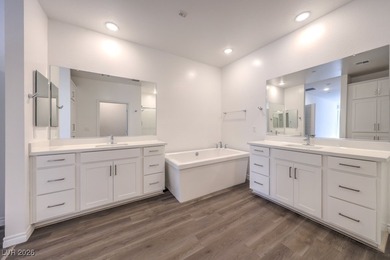 Experience unparalleled luxury in this second-floor corner unit