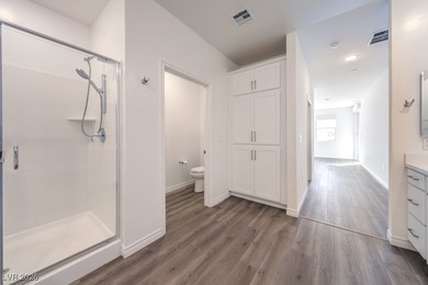 Experience unparalleled luxury in this second-floor corner unit