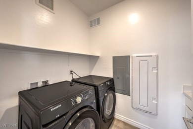 Experience unparalleled luxury in this second-floor corner unit