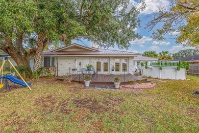 Welcome to this beautifully renovated 4-bedroom, 3-bath home in - photo 36