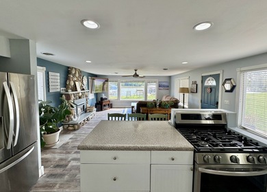 MOTIVATED SELLER! NO WATER INTRUSION DURING FLOODS! Waterfront - photo 9