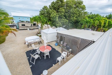 Nestled in the heart of Big Pine Key, this charming A-frame home - photo 24