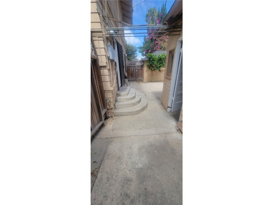 Discover the potential of this Duplex located at 411 E 8th - photo 24