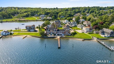 Tucked away on a quiet cul-de-sac on the western shore of the - photo 1