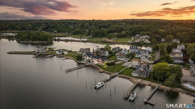 Tucked away on a quiet cul-de-sac on the western shore of the - photo 4
