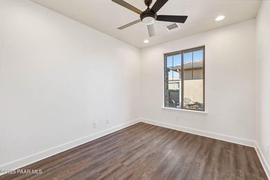 Located on the 9th hole of The Club at Prescott Lakes, this