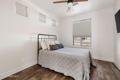 Located on the 9th hole of The Club at Prescott Lakes, this