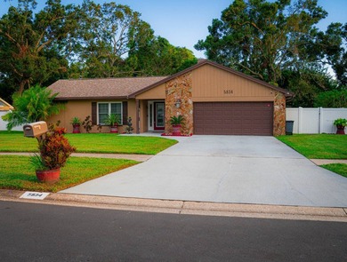 This charming three-bedroom, two-bathroom house offers a unique - photo 2