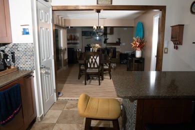 This charming three-bedroom, two-bathroom house offers a unique - photo 5