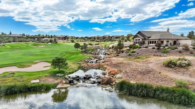 Located on the 9th hole of The Club at Prescott Lakes, this