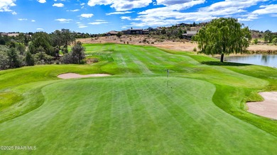 Located on the 9th hole of The Club at Prescott Lakes, this