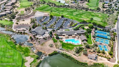 Located on the 9th hole of The Club at Prescott Lakes, this