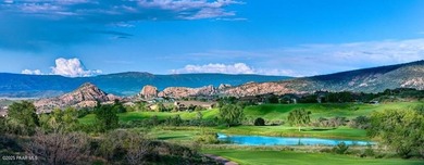 Located on the 9th hole of The Club at Prescott Lakes, this
