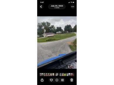 Mobile home with pole barn - photo 2