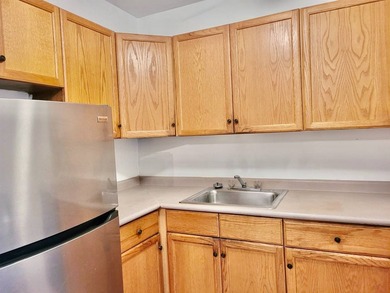 Welcome to Heritage House, Unit 1A with a front balcony! This - photo 3