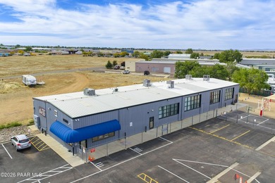 A fully improved, three-building industrial campus spanning 2.9 - photo 3