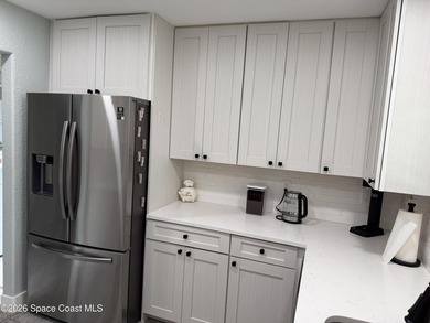 Beautifully updated 3-bedroom end-unit townhouse located in the - photo 6