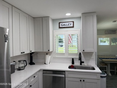 Beautifully updated 3-bedroom end-unit townhouse located in the - photo 7