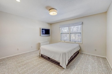 Move right into this top-floor, one-level home offering - photo 12