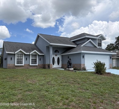 Welcome to this beautiful Southeast Palm Bay pool home! This - photo 1