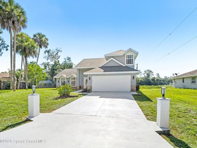 Welcome to this beautiful Southeast Palm Bay pool home! This - photo 2