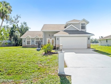 Welcome to this beautiful Southeast Palm Bay pool home! This - photo 3