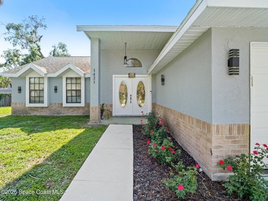 Welcome to this beautiful Southeast Palm Bay pool home! This - photo 4