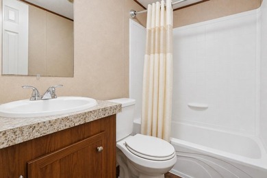 Affordable coastal living awaits in Baywood Estates! Located in - photo 15