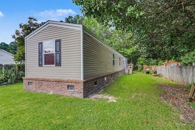 Affordable coastal living awaits in Baywood Estates! Located in - photo 25