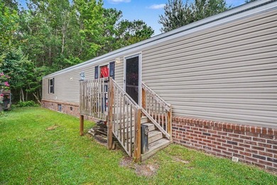 Affordable coastal living awaits in Baywood Estates! Located in - photo 29
