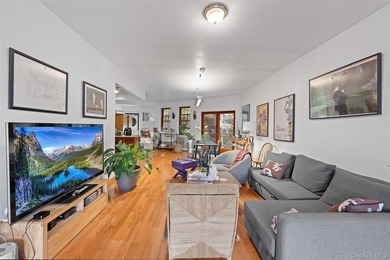 Discover this exceptional three-family property in one of - photo 3