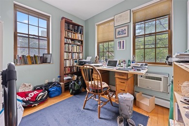 Discover this exceptional three-family property in one of - photo 8