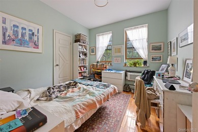 Discover this exceptional three-family property in one of - photo 10