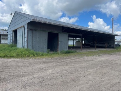 - 3 buildings Total SF: 9,280 SF - Water Street: Gravel, Runs - photo 1