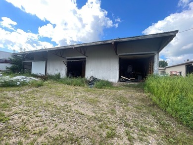 - 3 buildings Total SF: 9,280 SF - Water Street: Gravel, Runs - photo 2