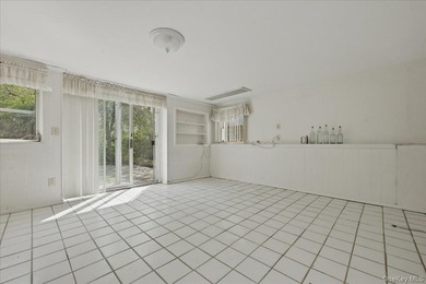 Spacious split-level home set on a huge, private wooded property - photo 22