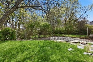 Spacious split-level home set on a huge, private wooded property - photo 27