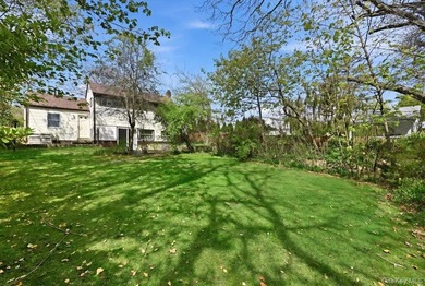 Spacious split-level home set on a huge, private wooded property - photo 29
