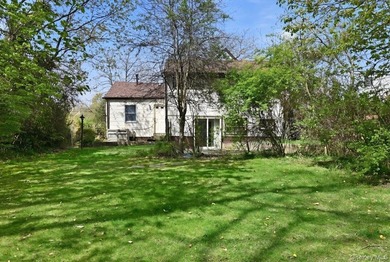 Spacious split-level home set on a huge, private wooded property - photo 30