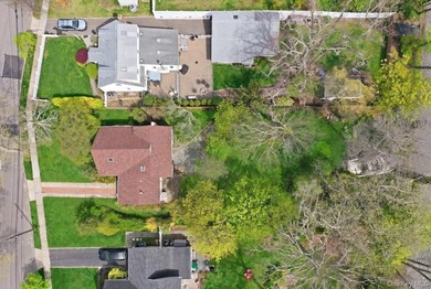 Spacious split-level home set on a huge, private wooded property - photo 35