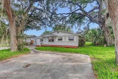 PRICED TO SELL! Cottage charm meets coastal opportunity! Tucked - photo 1