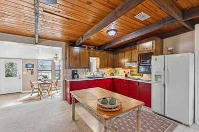 Welcome home to easy lakeside living! Steel construction with - photo 11