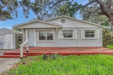 PRICED TO SELL! Cottage charm meets coastal opportunity! Tucked - photo 4