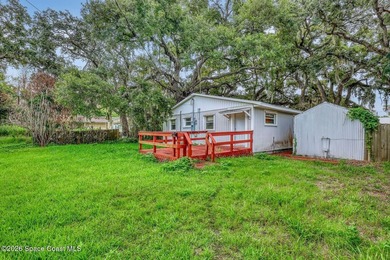 PRICED TO SELL! Cottage charm meets coastal opportunity! Tucked - photo 5